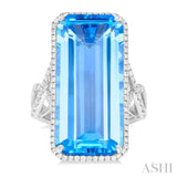 26x12 MM Emerald Cut Blue Topaz and 1/2 ctw Round Cut Diamond Halo Semi Precious Ring in 14K White Gold
