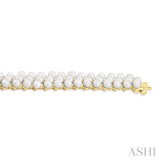 4 MM Interlocked Clover Cultured Pearl and 1 ctw Round Cut Diamond Fashion Bracelet in 14K Yellow Gold