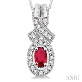 5x3 MM Oval Cut Ruby and 1/50 ctw Single Cut Diamond Pendant in Sterling Silver with Chain