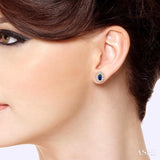 5x3MM Oval Cut Sapphire and 1/4 ctw Round Cut Diamond Earrings in 14K Yellow Gold