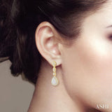5/8 Ctw Pear Shape Halo Lovebright Round Cut Diamond Earrings in 14K Yellow and White Gold