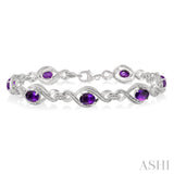 7x5 MM Oval Cut Amethyst and 1/10 ctw Round Cut Diamond Semi Precious Bracelet in Sterling Silver