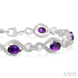 7x5 MM Oval Cut Amethyst and 1/10 ctw Round Cut Diamond Semi Precious Bracelet in Sterling Silver