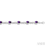 7x5 MM Oval Cut Amethyst and 1/10 ctw Round Cut Diamond Semi Precious Bracelet in Sterling Silver