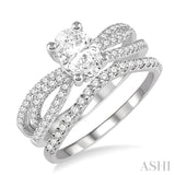 1 1/3 ctw Diamond Wedding Set with 1 1/6 ctw Oval Cut Engagement Ring and 1/5 ctw Wedding Band in 14K White Gold