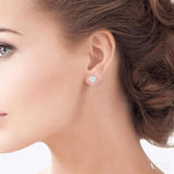 3/4 Ctw Heart Shape Lovebright Round Cut Diamond Stud Earrings in 14K White Gold