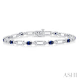 1/10 ctw Oval Cut 4X3 MM Sapphire and Round Cut Diamond Paper Clip Bracelet in 14K White Gold