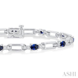 1/10 ctw Oval Cut 4X3 MM Sapphire and Round Cut Diamond Paper Clip Bracelet in 14K White Gold