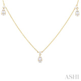 1/2 ctw Tear Drop Fusion Baguette and Round Cut Diamond Station Necklace in 14K Yellow Gold