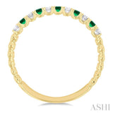 1.75 MM Emerald and 1/6 Ctw Round Cut Diamond Precious Wedding Band in 14K Yellow Gold