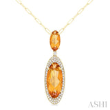 18x8 MM & 10x5 MM Oval Cut Citrine and 1/3 ctw Round Cut Diamond Halo Semi Precious Pendant With Chain in 14K Yellow Gold