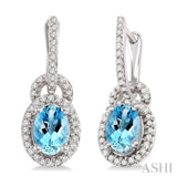 7x5mm Oval Cut Aquamarine and 1/3 Ctw Round Cut Diamond Earrings in 14K White Gold