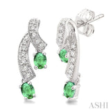 4x3MM Oval Cut Emerald and 1/5 Ctw Round Cut Diamond Earrings in 14K White Gold